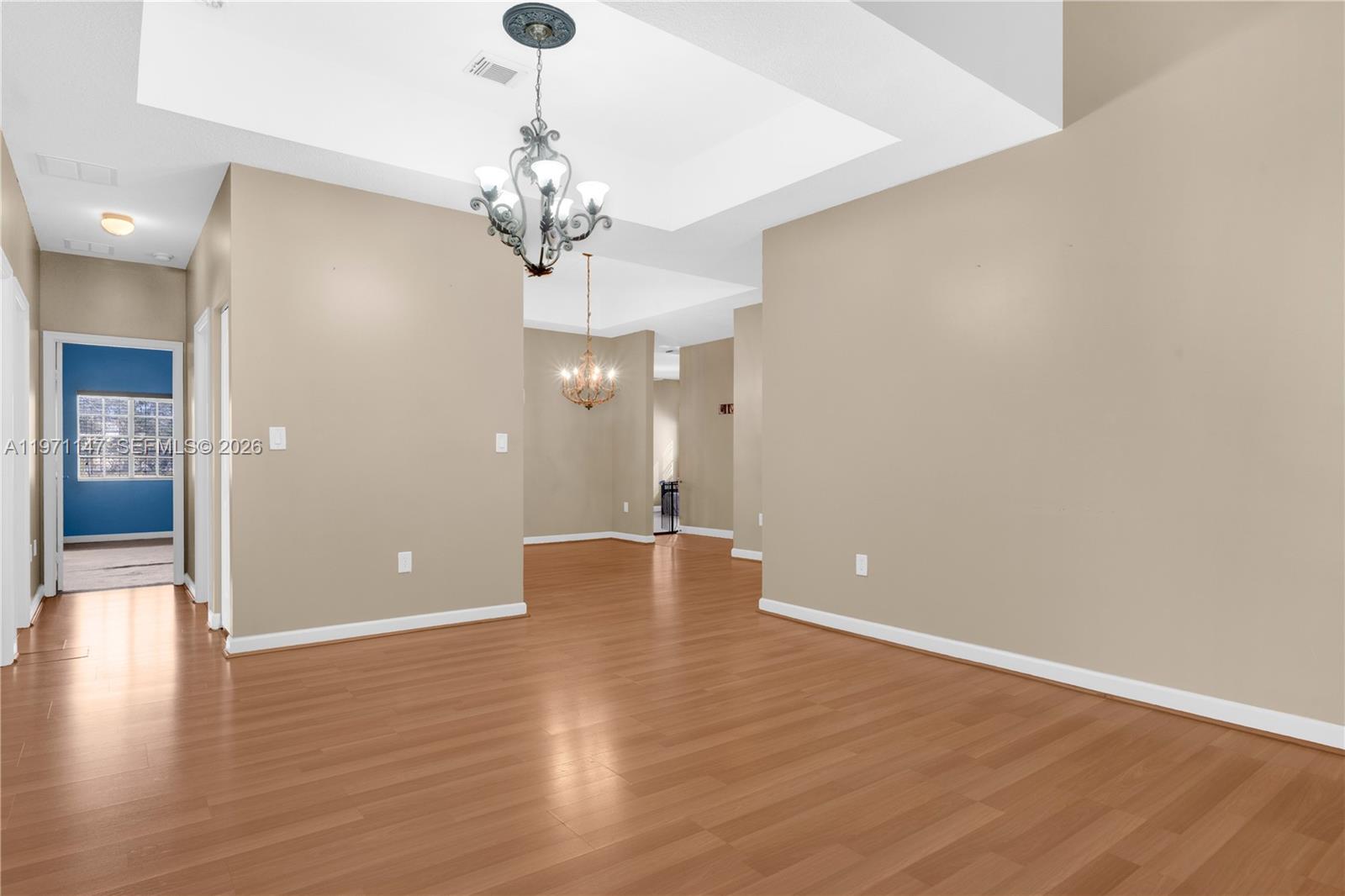 2875 Northeast 4th Street Homestead, FL 33033 - Photo 7 of 53 a view of a livingroom with a chandelier