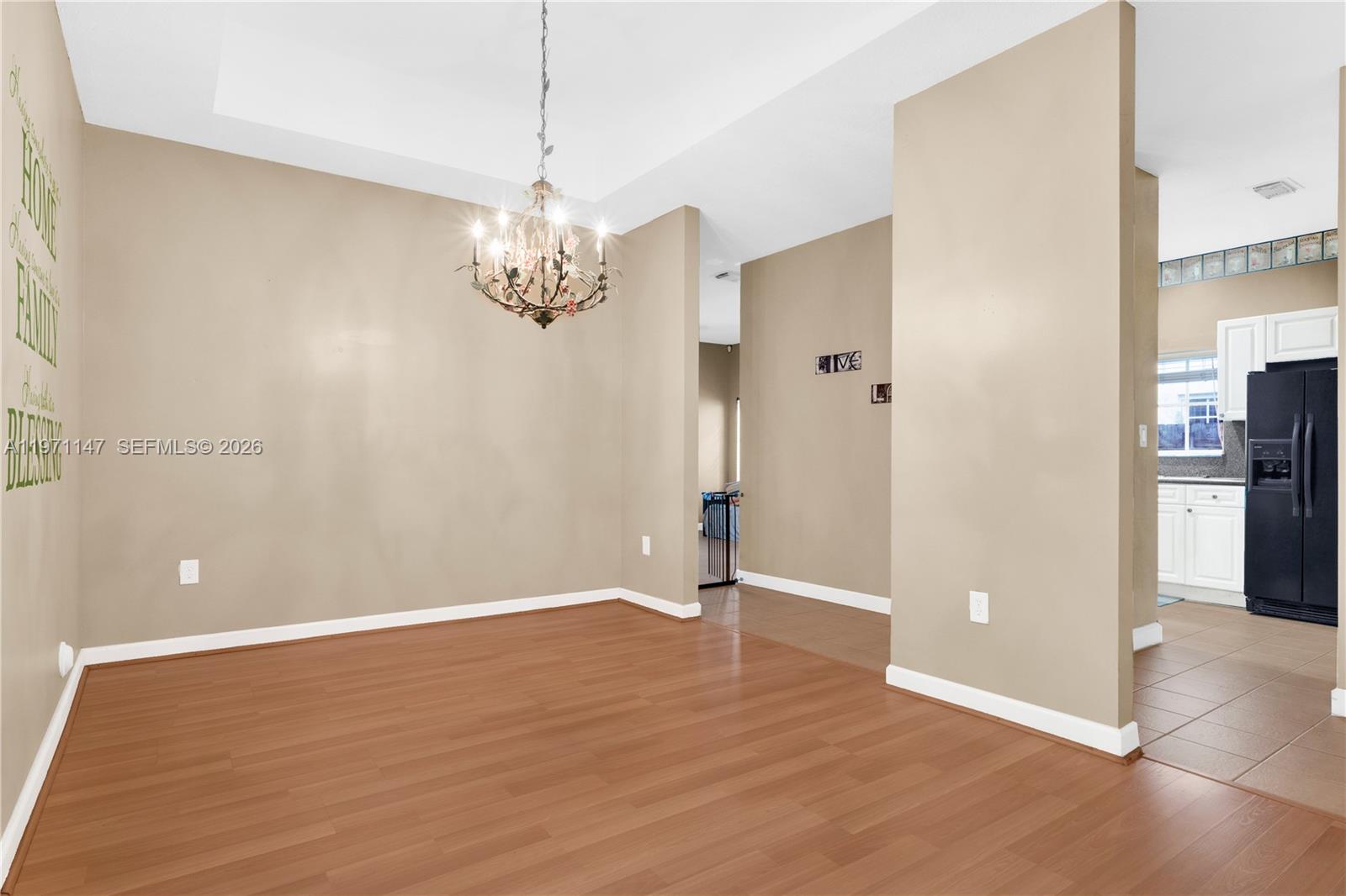 2875 Northeast 4th Street Homestead, FL 33033 - Photo 8 of 53 a view of empty room with wooden floor