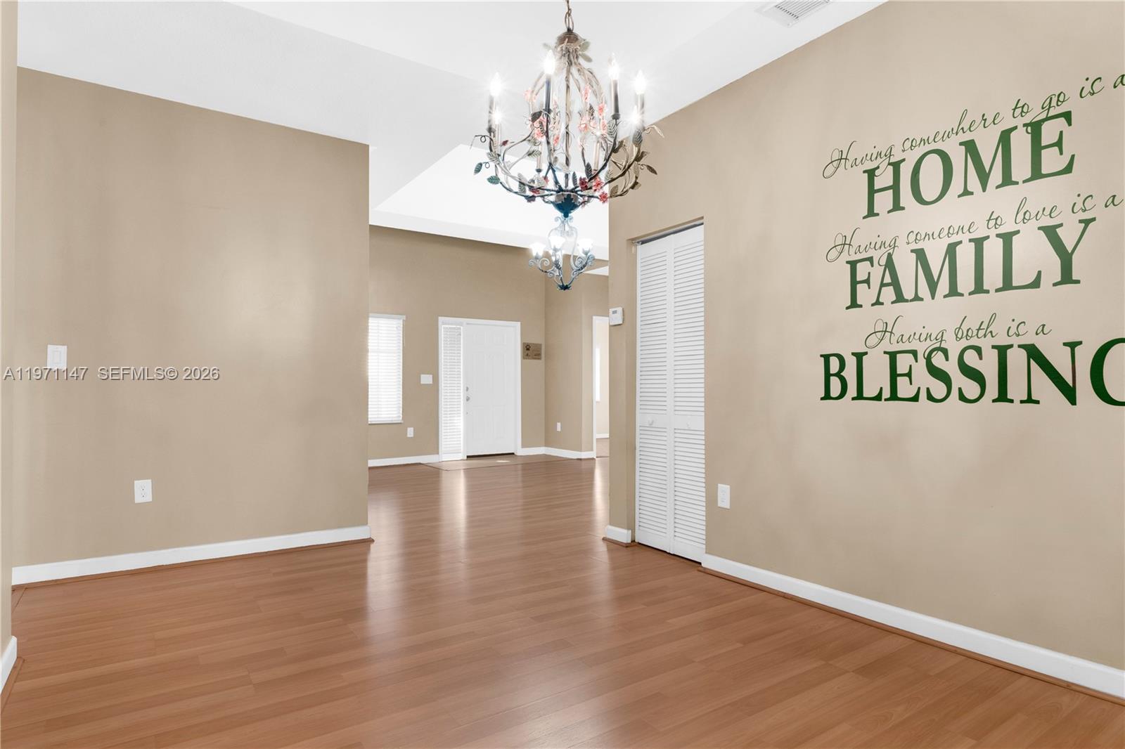 2875 Northeast 4th Street Homestead, FL 33033 - Photo 10 of 53 a view of an entryway with wooden floor