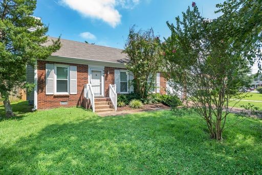 308 Cedarcliff Road Antioch, TN 37013 - Photo 1 of 20 a view of a house with backyard and a tree