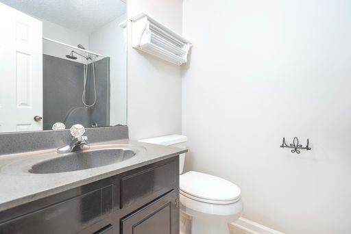 308 Cedarcliff Road Antioch, TN 37013 - Photo 12 of 20 a bathroom with a sink toilet and a mirror