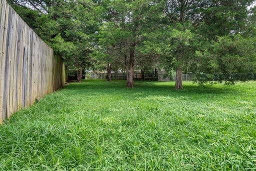 308 Cedarcliff Road Antioch, TN 37013 - Photo 20 of 20 a view of a backyard with large trees