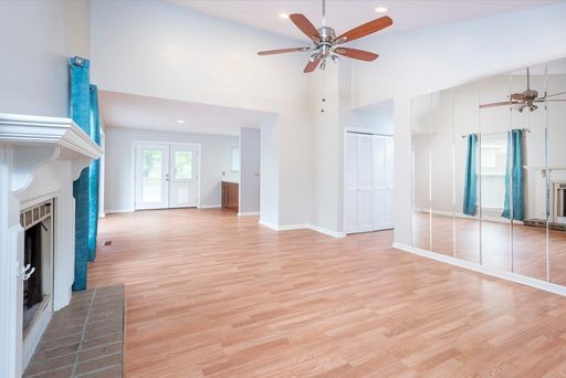 308 Cedarcliff Road Antioch, TN 37013 - Photo 4 of 20 a view of a livingroom with a fireplace a ceiling fan and hardwood floor