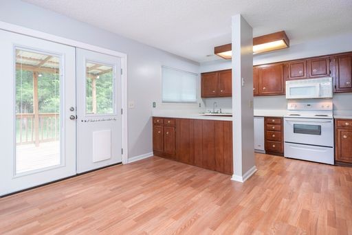 308 Cedarcliff Road Antioch, TN 37013 - Photo 7 of 20 a view of kitchen with wooden floor and electronic appliances