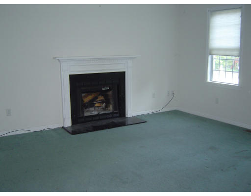 7 Leland Hill Road Sutton, MA 01590 - Photo 6 of 7 a room with a fireplace