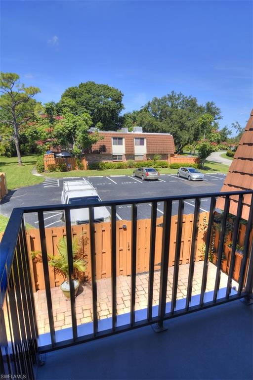 1468 Park Shore Circle, Unit 4 Fort Myers, FL 33901 - Photo 30 of 32 a balcony view with a yard