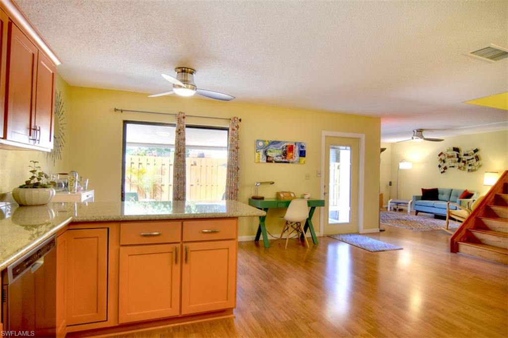 1468 Park Shore Circle, Unit 4 Fort Myers, FL 33901 - Photo 9 of 32 a living room with furniture and a large window