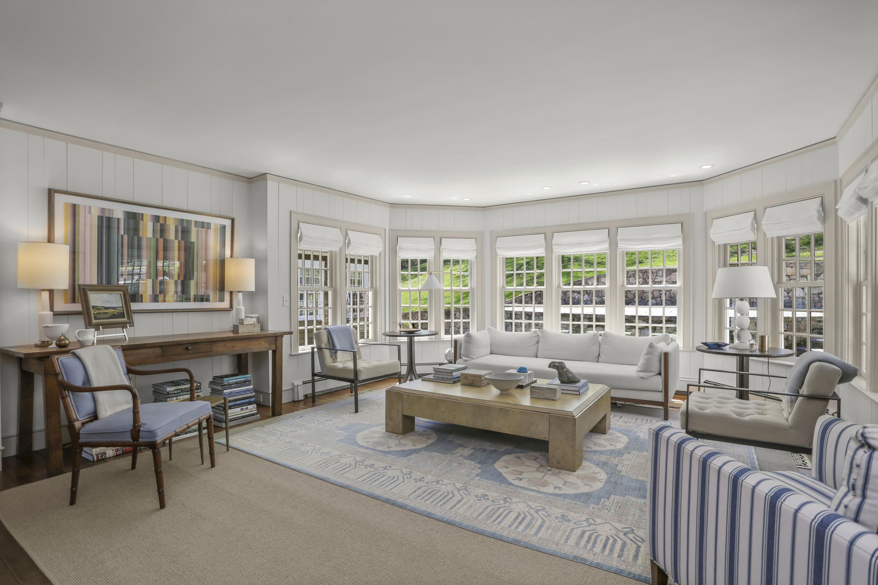 215 Cross Ridge Road New Canaan, CT 06840 - Photo 14 of 50 a living room with furniture and a large window