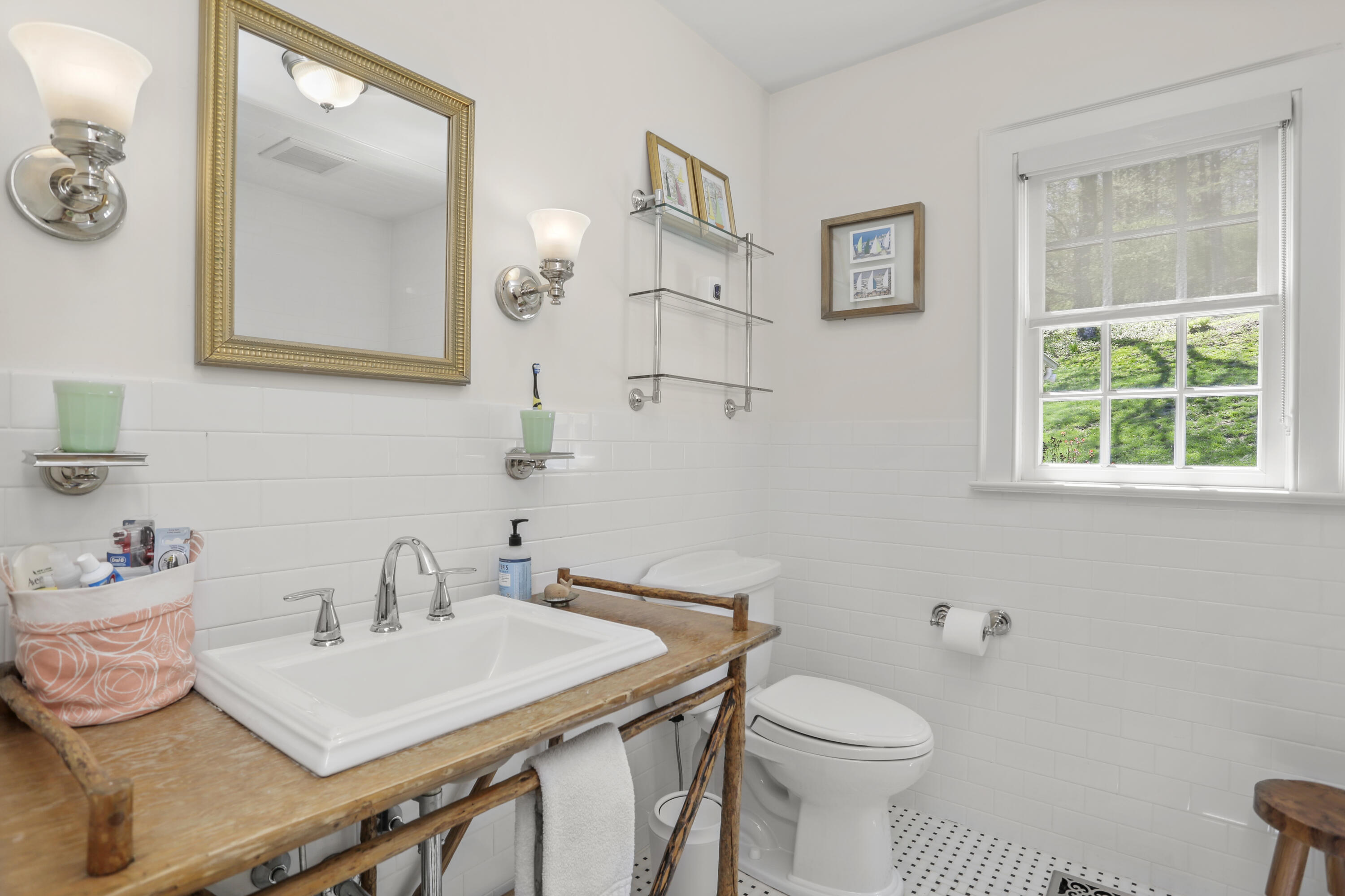 215 Cross Ridge Road New Canaan, CT 06840 - Photo 22 of 50 a bathroom with a sink and a toilet
