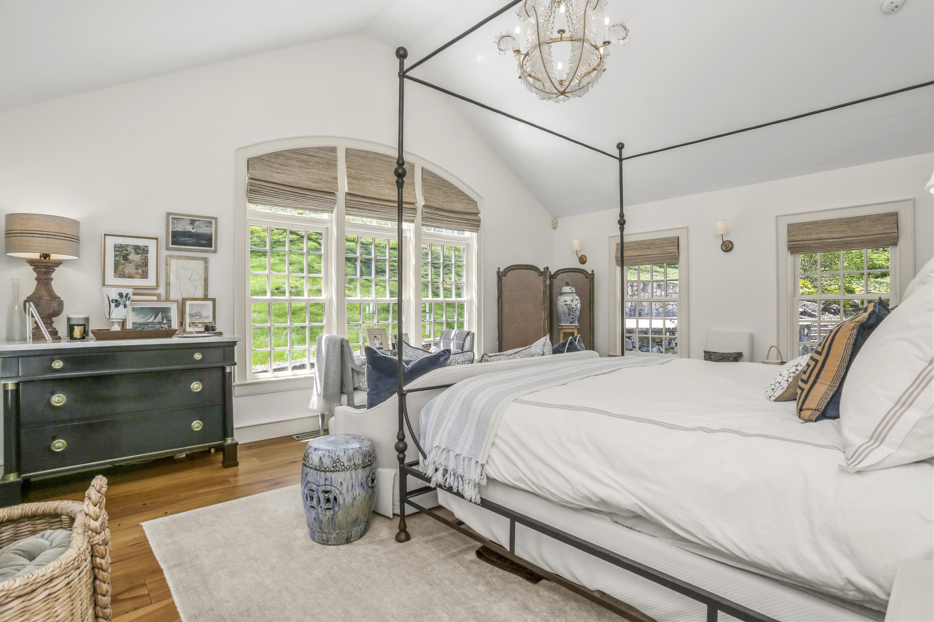 215 Cross Ridge Road New Canaan, CT 06840 - Photo 23 of 50 a bedroom with a bed and large mirror