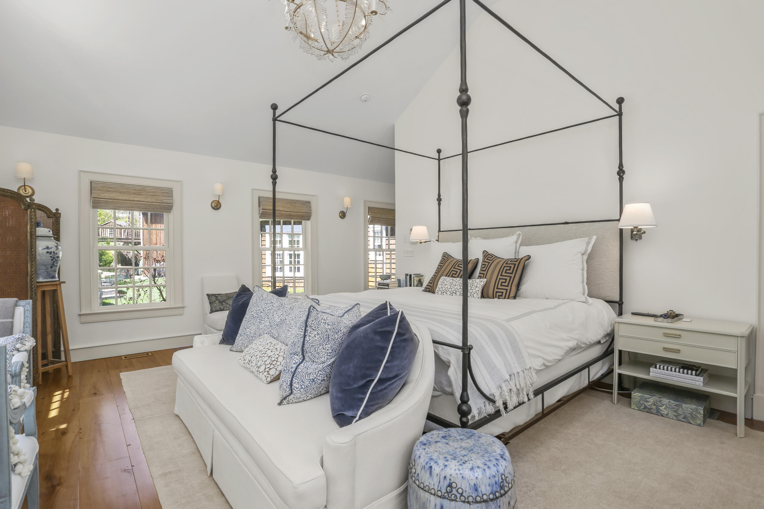 215 Cross Ridge Road New Canaan, CT 06840 - Photo 24 of 50 a bedroom with a bed and a window