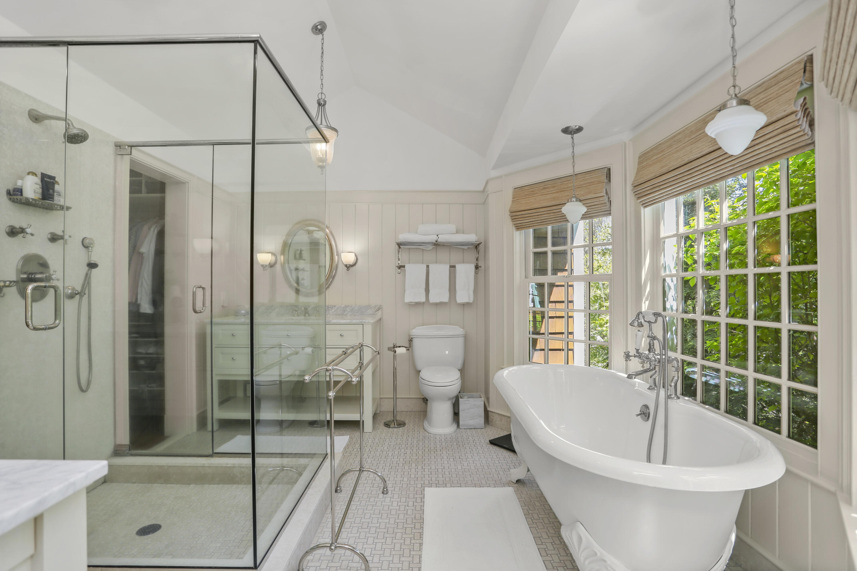 215 Cross Ridge Road New Canaan, CT 06840 - Photo 25 of 50 a spacious bathroom with a bathtub and shower