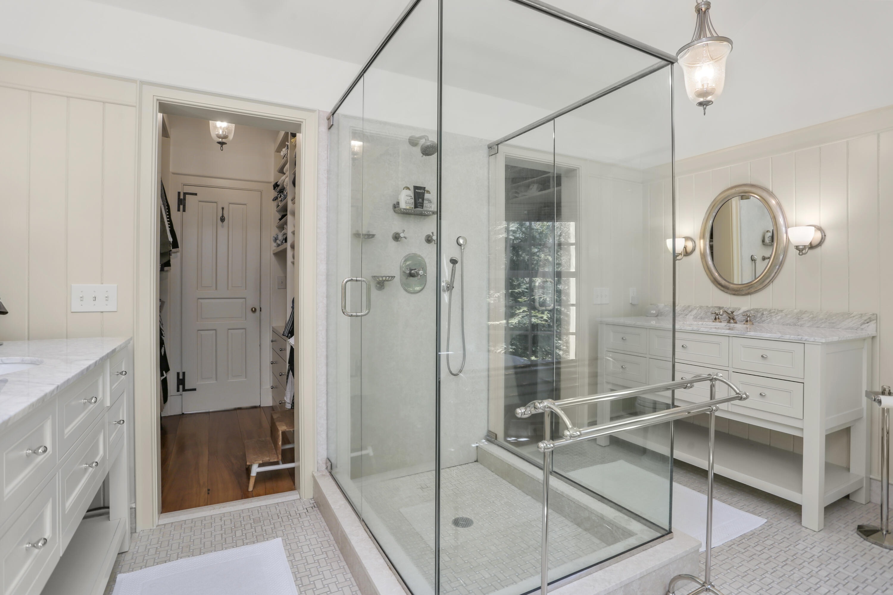 215 Cross Ridge Road New Canaan, CT 06840 - Photo 28 of 50 a bathroom with a shower a sink and a mirror