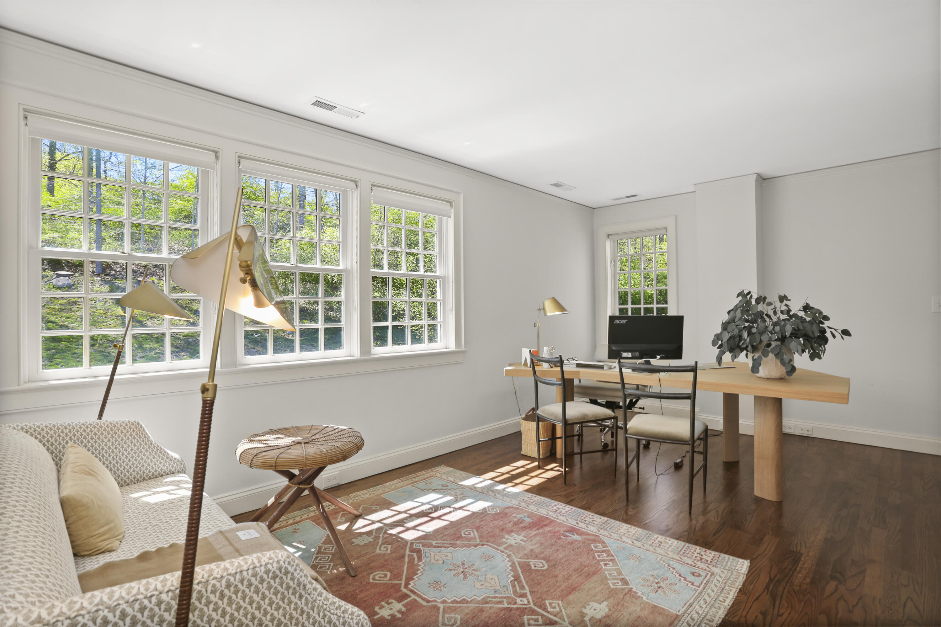 215 Cross Ridge Road New Canaan, CT 06840 - Photo 31 of 50 a living room with furniture and a large window