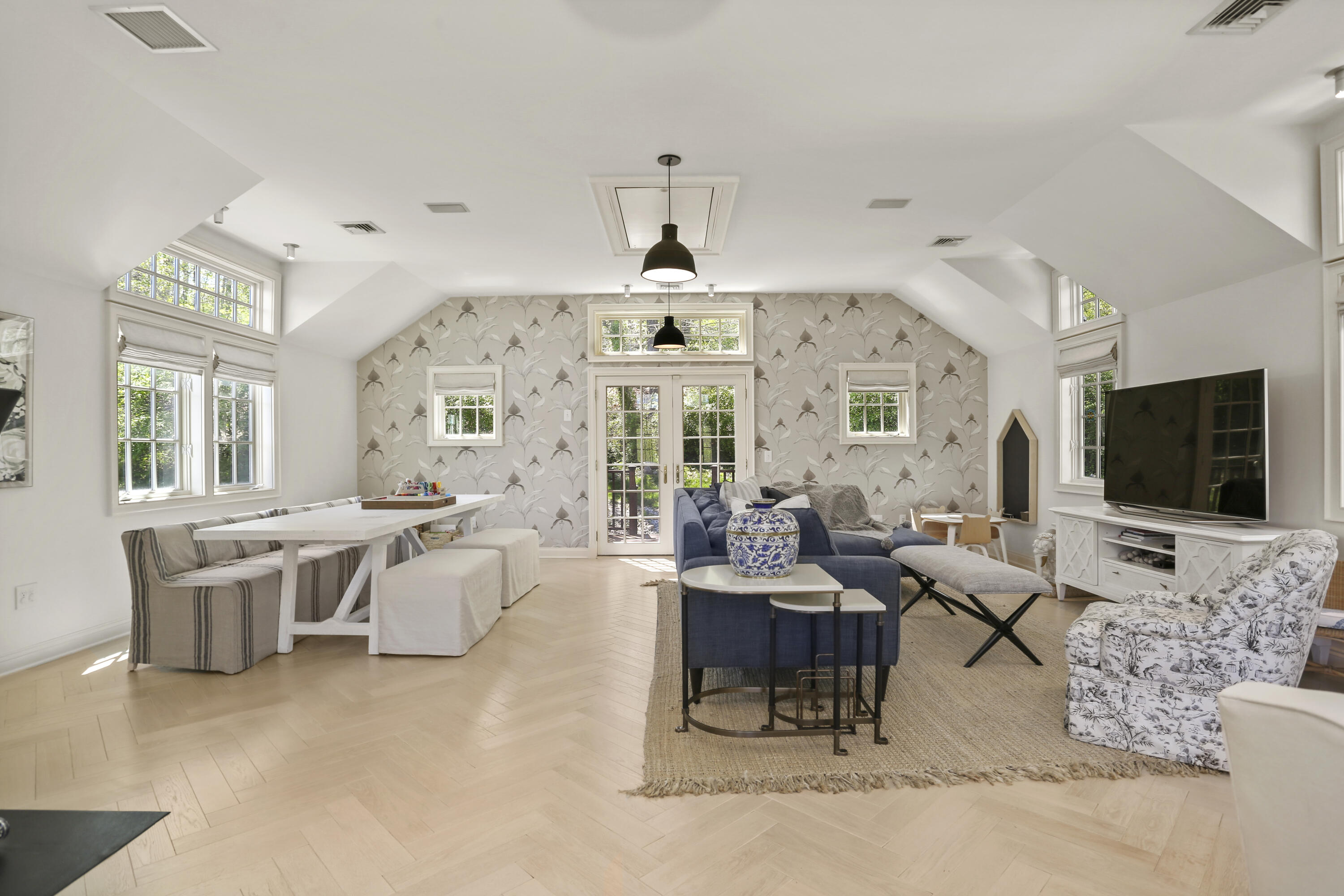 215 Cross Ridge Road New Canaan, CT 06840 - Photo 38 of 50 a living room with fireplace furniture and a flat screen tv