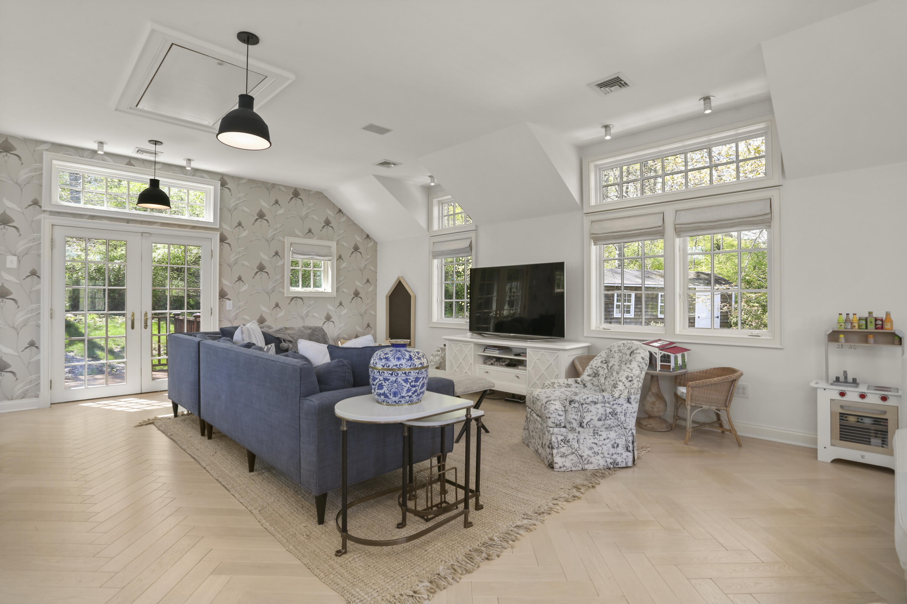 215 Cross Ridge Road New Canaan, CT 06840 - Photo 40 of 50 a living room with furniture and a flat screen tv