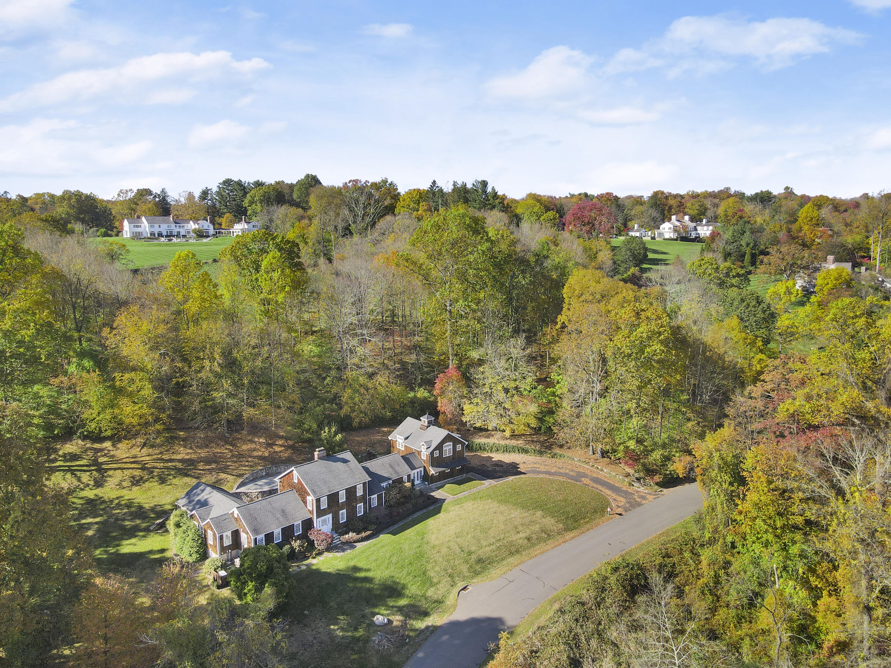 215 Cross Ridge Road New Canaan, CT 06840 - Photo 46 of 50 a view of a lake in middle of green field