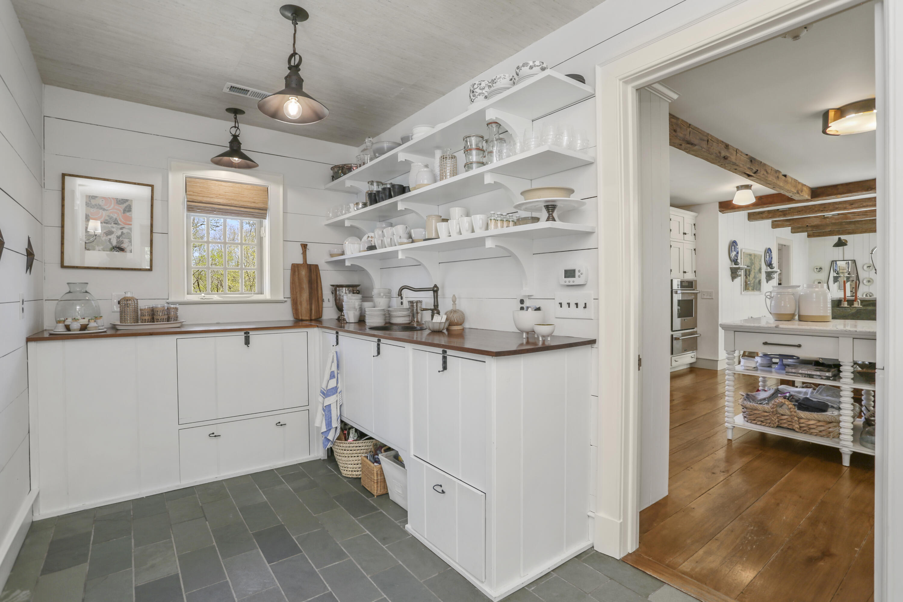215 Cross Ridge Road New Canaan, CT 06840 - Photo 5 of 50 a kitchen with stainless steel appliances a refrigerator and a stove