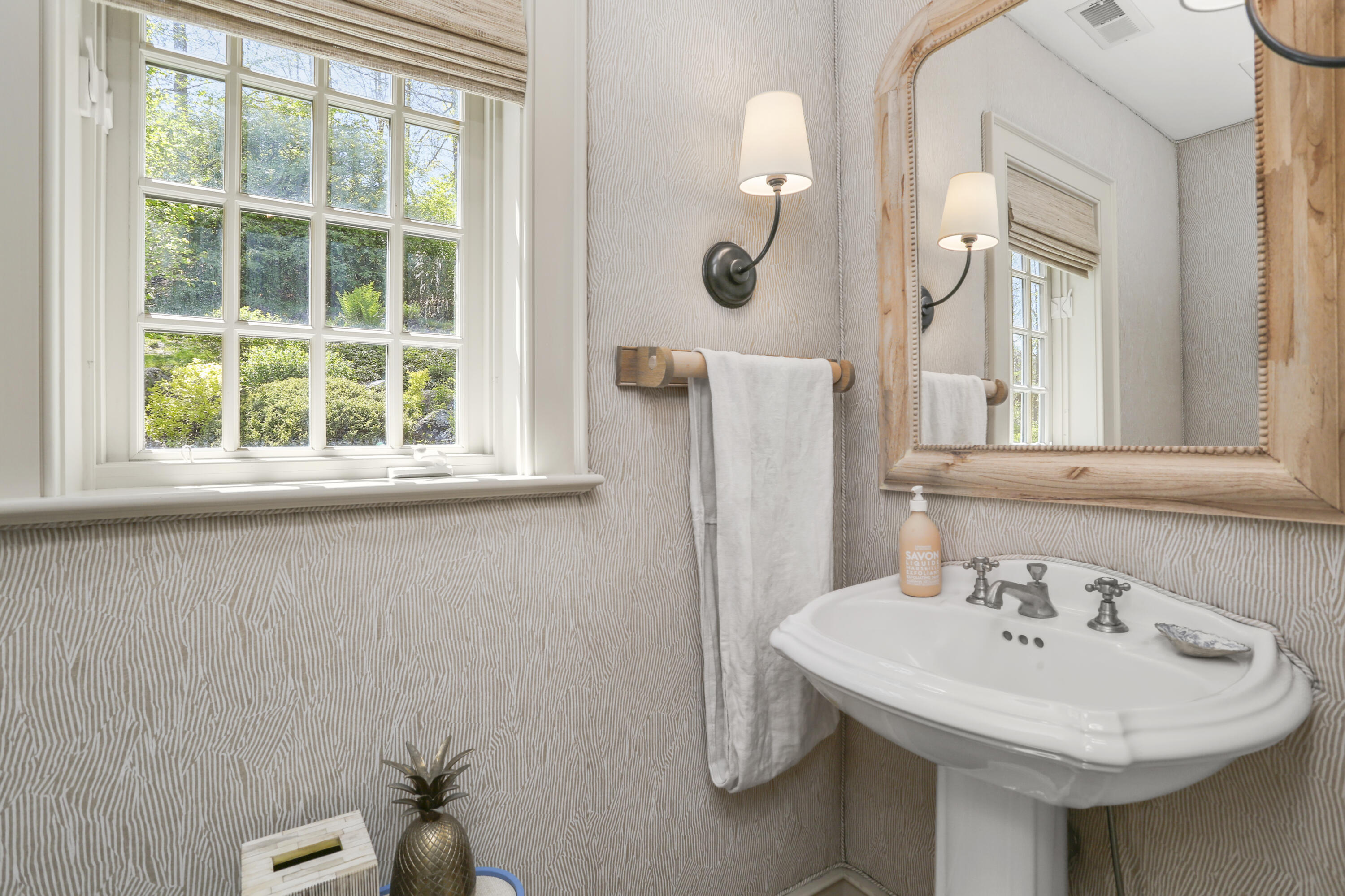 215 Cross Ridge Road New Canaan, CT 06840 - Photo 6 of 50 a bathroom with a sink and a mirror