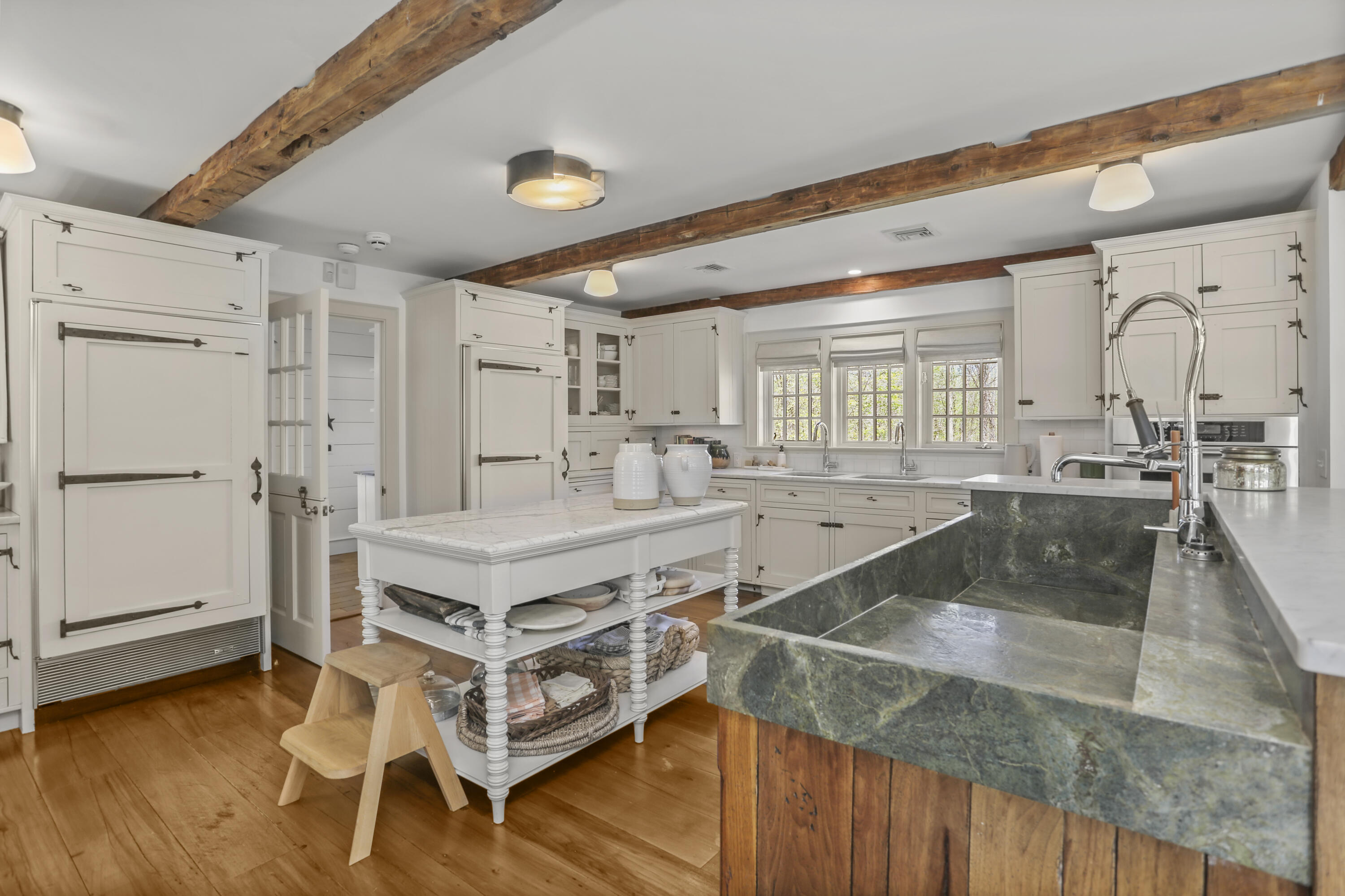 215 Cross Ridge Road New Canaan, CT 06840 - Photo 10 of 50 a kitchen with stainless steel appliances granite countertop a stove and a refrigerator