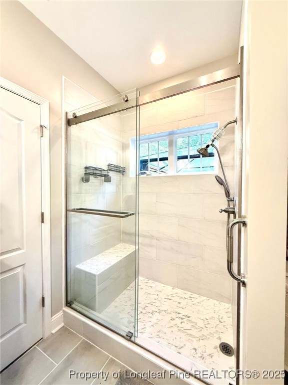 107 Judiciary Court Cameron, NC 28326 - Photo 19 of 49 a bathroom with a glass shower door