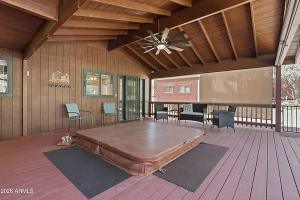 a view of a livingroom with furniture and wooden floor