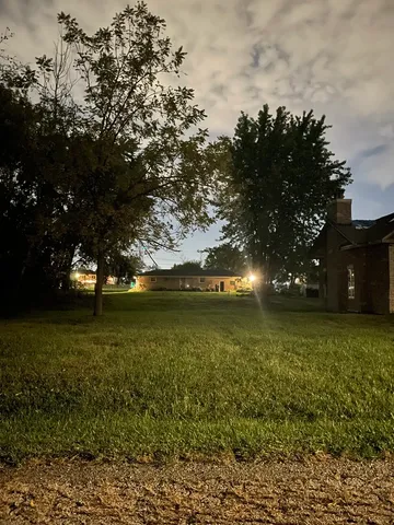 a view of outdoor space and yard