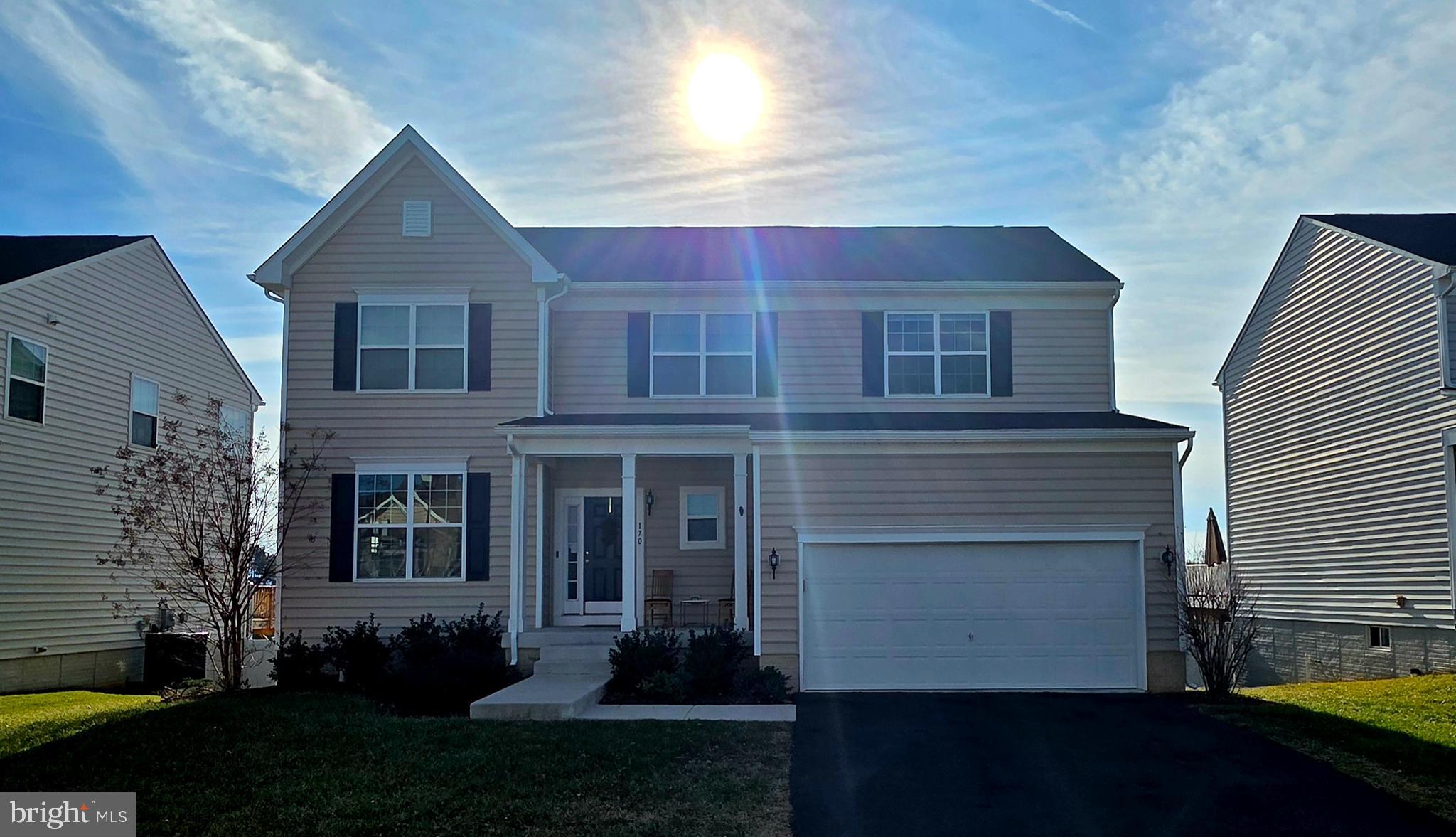 170 Shallow Creek Drive Ranson, WV 25438 - Photo 1 of 1 a front view of a house with a garden
