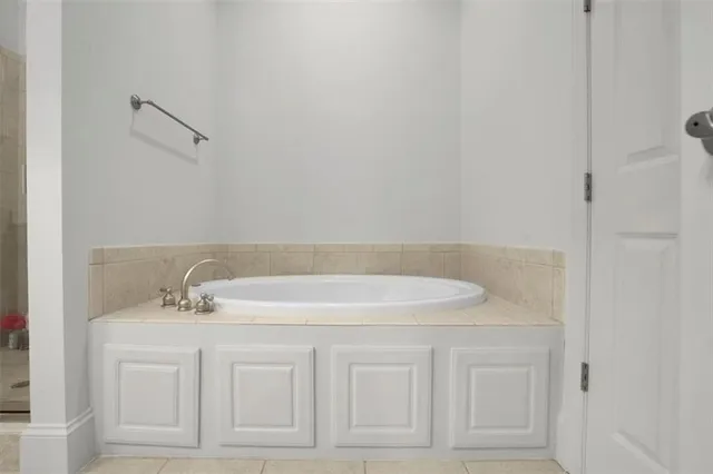 a bathroom with a sink and vanity