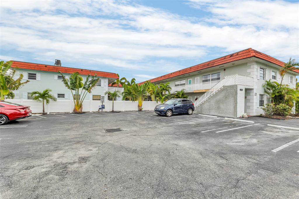 2201 Northeast 36th Street, Unit 205 Lighthouse Point, FL 33064 - Photo 31 of 40 a view of a house with a outdoor space