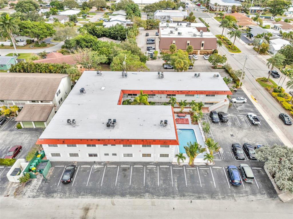 2201 Northeast 36th Street, Unit 205 Lighthouse Point, FL 33064 - Photo 37 of 40 an aerial view of a swimming pool