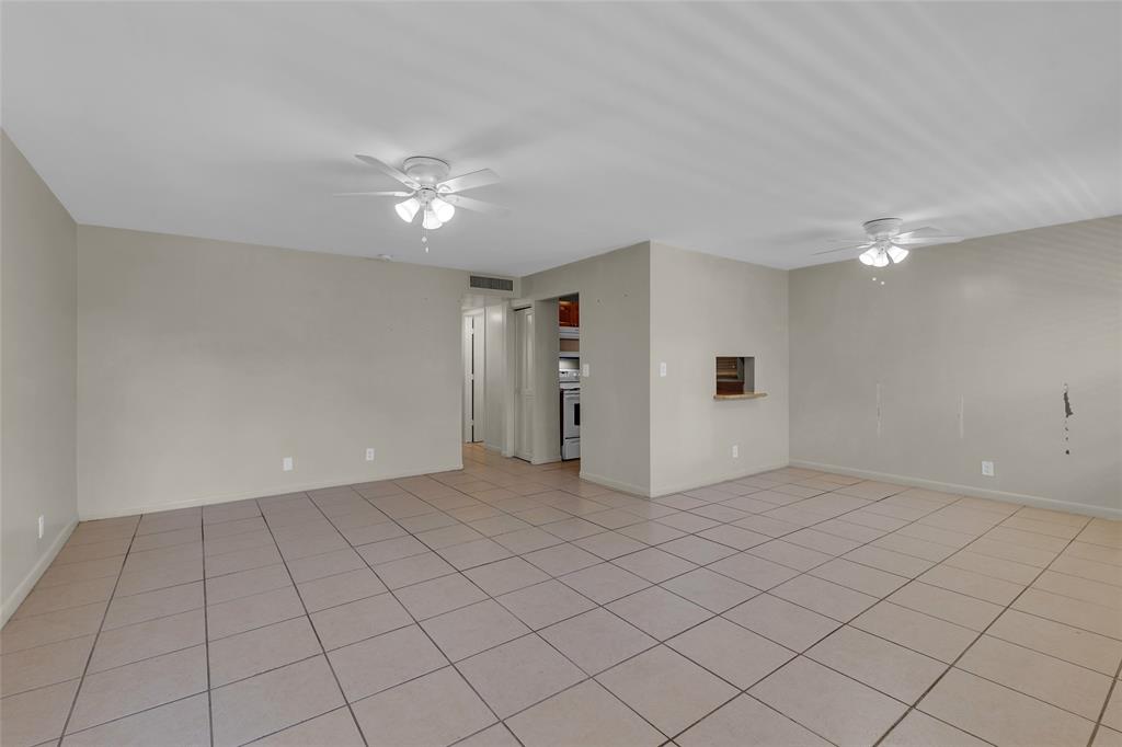 2201 Northeast 36th Street, Unit 205 Lighthouse Point, FL 33064 - Photo 4 of 40 wooden floor in an empty room