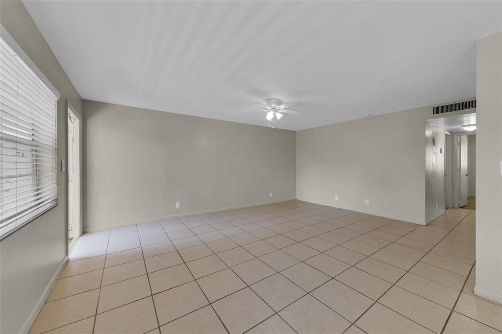 2201 Northeast 36th Street, Unit 205 Lighthouse Point, FL 33064 - Photo 7 of 40 a view of an empty room and window