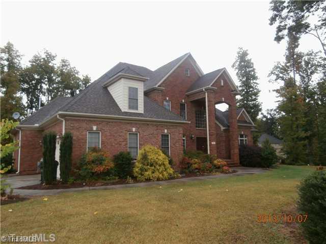 1705 Rita Court Oak Ridge, NC 27310 - Photo 1 of 7 Exterior Front.