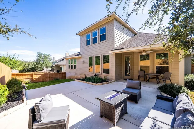 a view of a house with couches in a patio