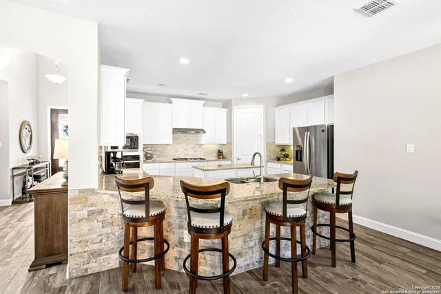 a view of a dining room with furniture