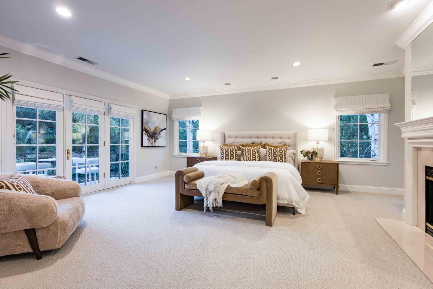 37 Valley Road Atherton, CA 94027 - Photo 20 of 39 a spacious bedroom with a bed and glass window