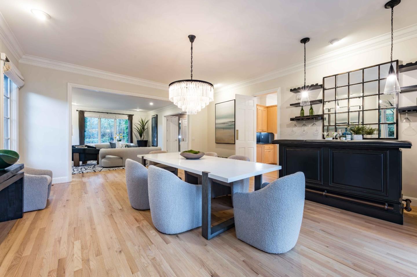 37 Valley Road Atherton, CA 94027 - Photo 8 of 39 a view of a dining room and livingroom with furniture wooden floor a chandelier