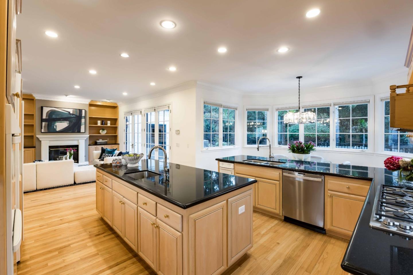 37 Valley Road Atherton, CA 94027 - Photo 10 of 39 a kitchen with stainless steel appliances granite countertop a sink and a stove top oven