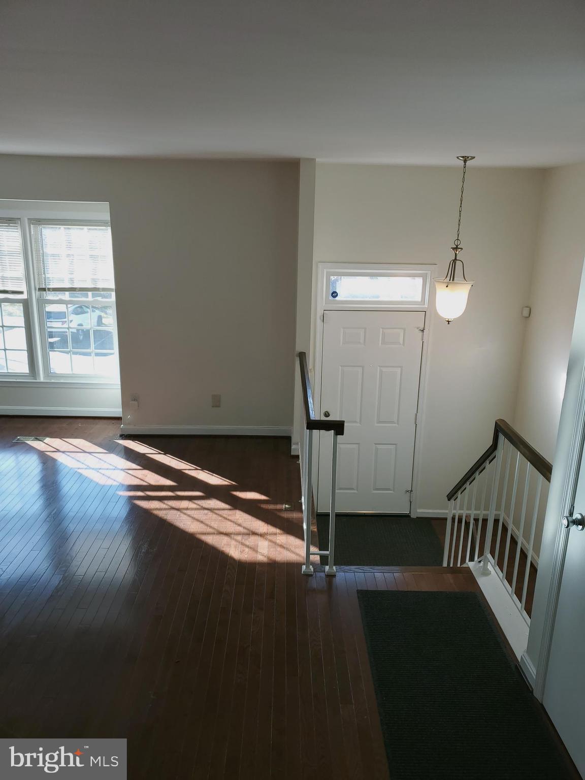 14522 Cambridge Circle Laurel, MD 20707 - Photo 2 of 15 a view of empty room with wooden floor