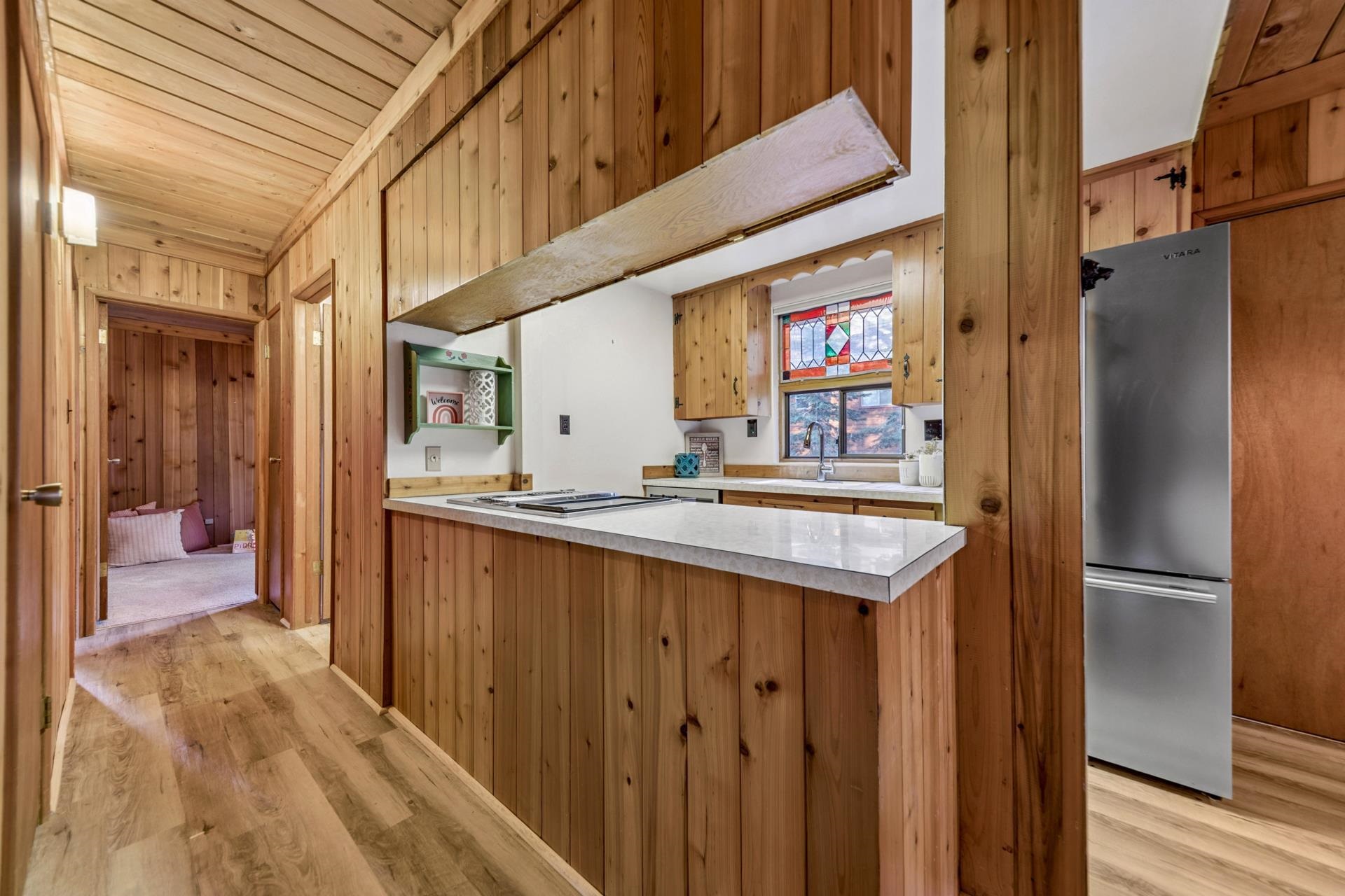14527 Christie Lane Truckee, CA 96161 - Photo 12 of 19 a kitchen with stainless steel appliances granite countertop a refrigerator and a sink