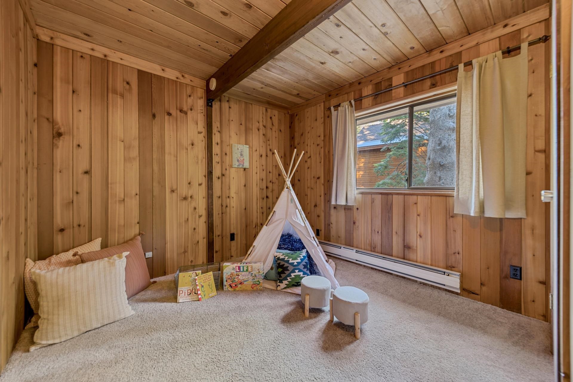 14527 Christie Lane Truckee, CA 96161 - Photo 13 of 19 a room with gym equipment and windows