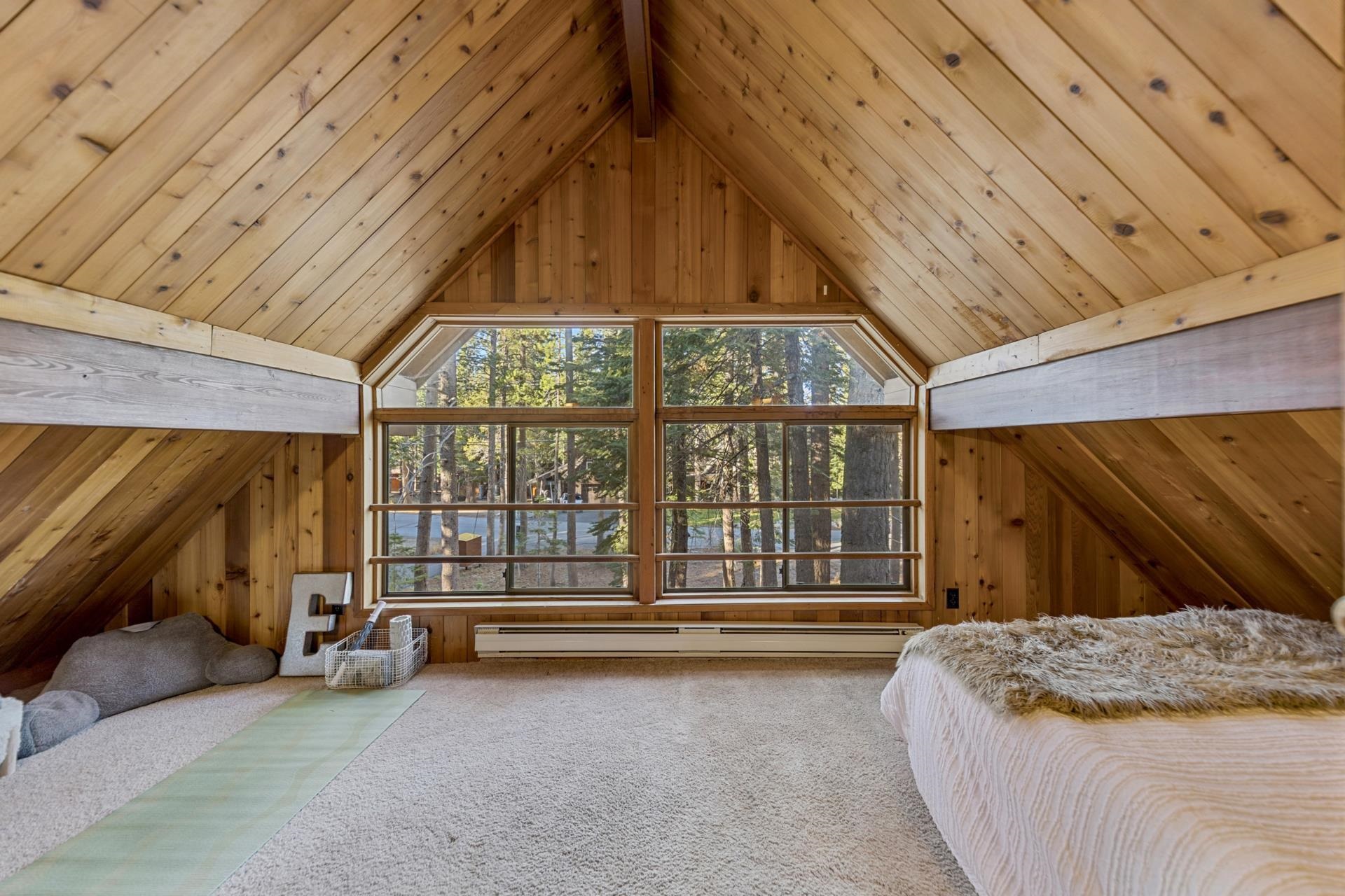 14527 Christie Lane Truckee, CA 96161 - Photo 15 of 19 a bed sitting in a room next to a window