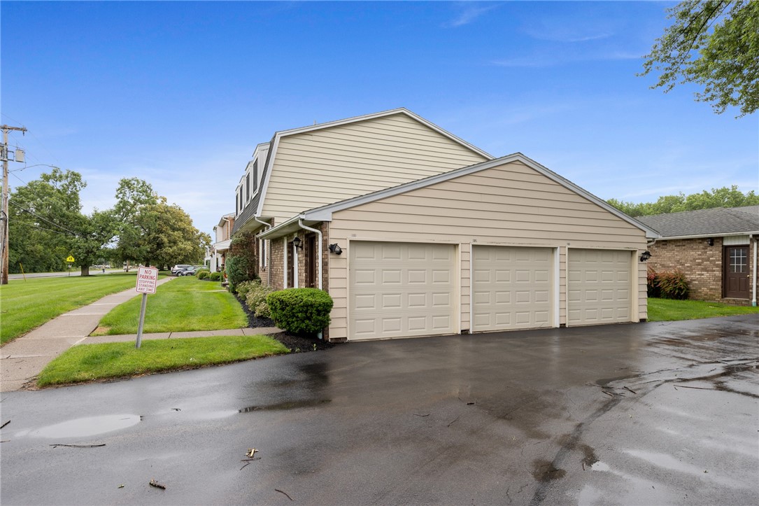 597 French Road Brighton, NY 14618 - Photo 24 of 24 Garage space is the closest to the home and is on the far left.