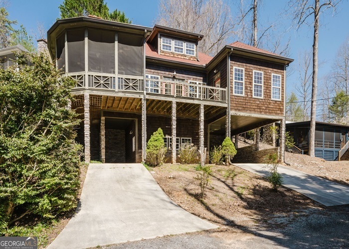 a view of house with a outdoor space