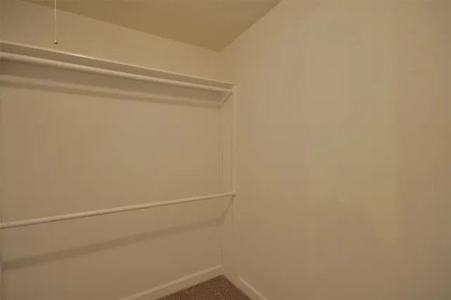 a view of small space with racks on the wall