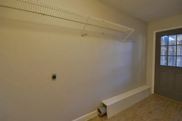 a view of a room with rack on the wall