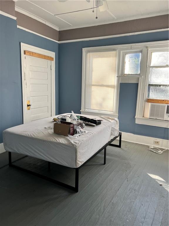 579 Charles Street Macon, GA 31206 - Photo 6 of 12 a bedroom with a bed and window