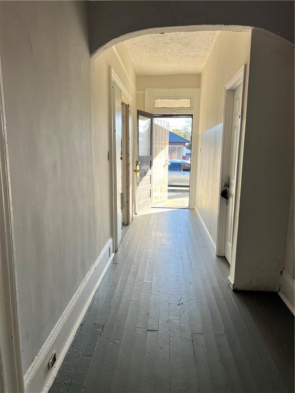 579 Charles Street Macon, GA 31206 - Photo 7 of 12 a view of a hallway with wooden floor and closet