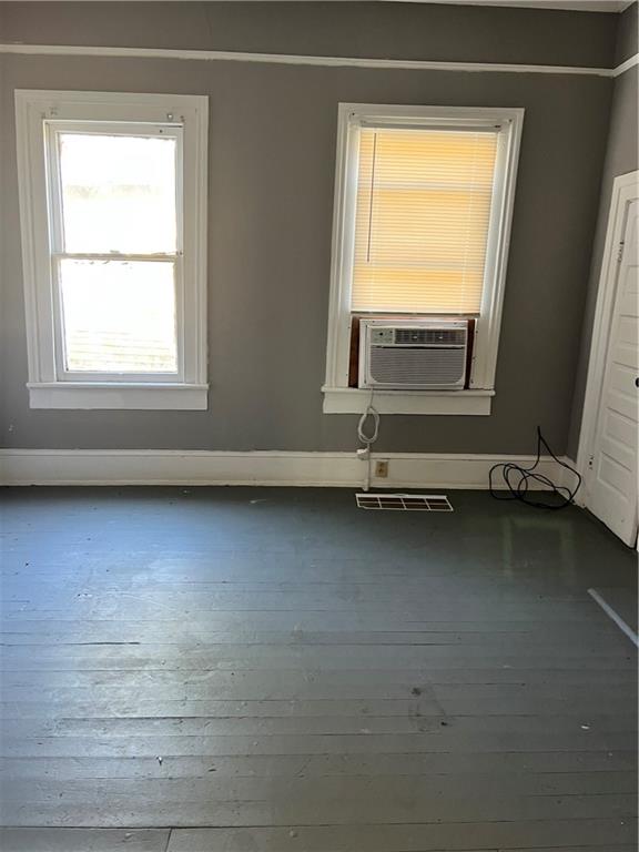 579 Charles Street Macon, GA 31206 - Photo 9 of 12 a view of an empty room with a window